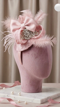 Pink lace and feather fascinator